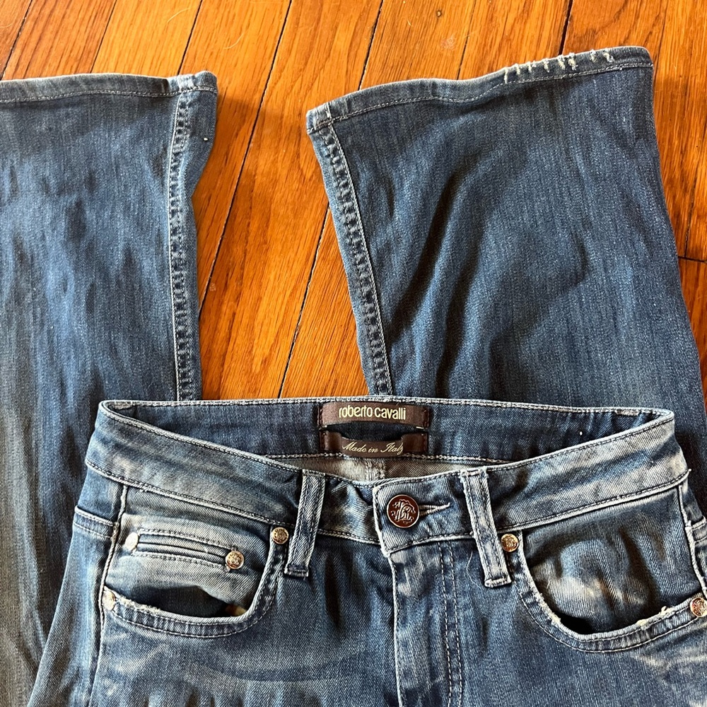Roberto Cavalli designer denim lightwash bootcut unique jeans.